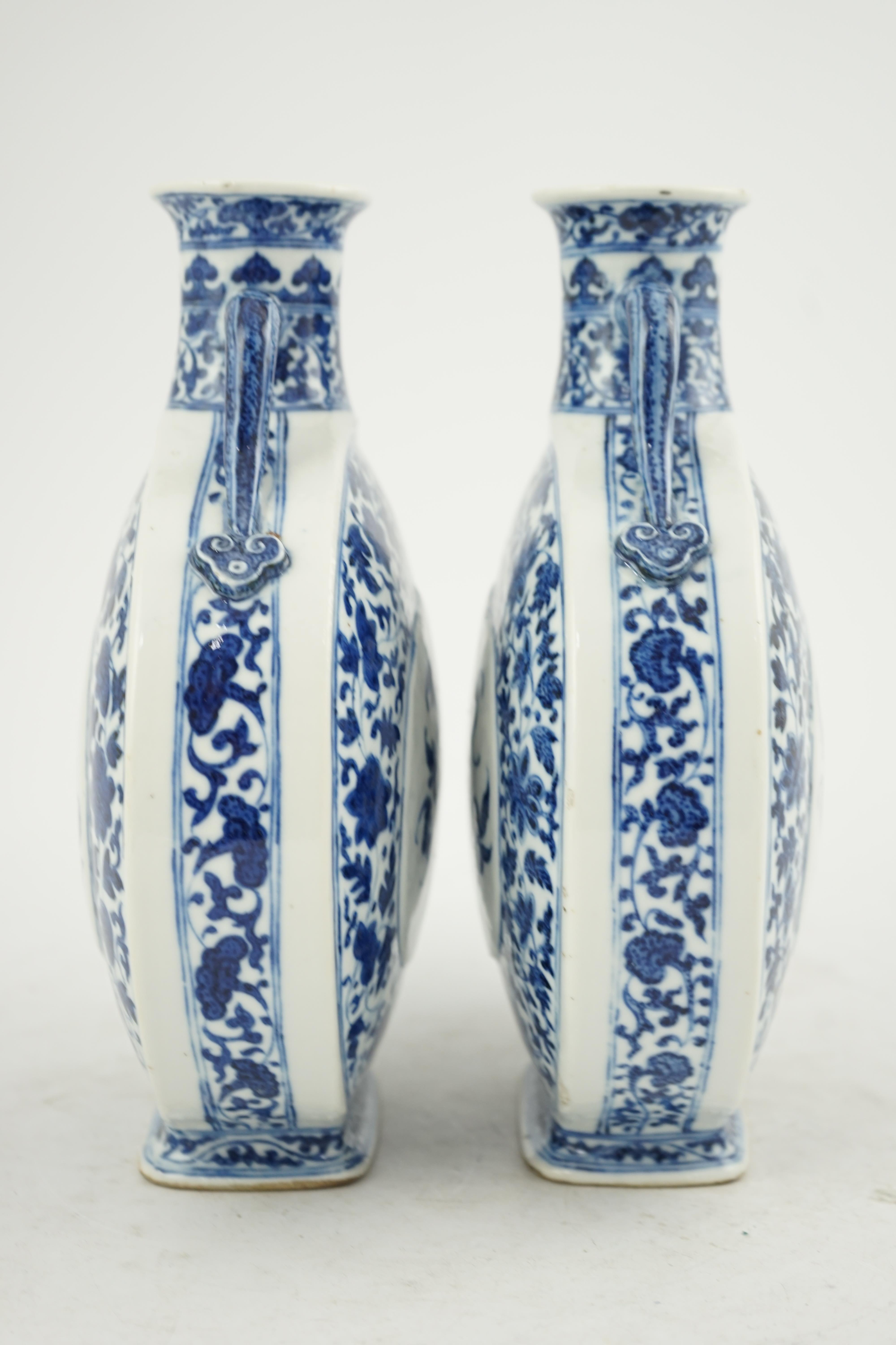 A near pair of Chinese blue and white moonflasks, bianhu, Daoguang seal marks and of the period (1821-50)